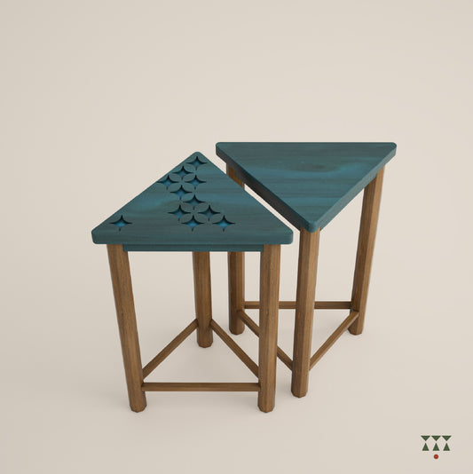 Set of 2 handcrafted wooden side tables with a triangular top tinted in blue, with one tabletop having cutout details