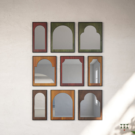 9 individual wood framed mirrors, with arch shapes tinted in moringa green, saffron orange, mustard yellow & mocha brown