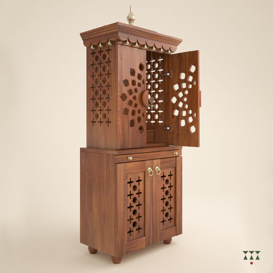 A tall wooden mandir with doors, pure brass elements, cutwork designs and storage, tinted in almond brown