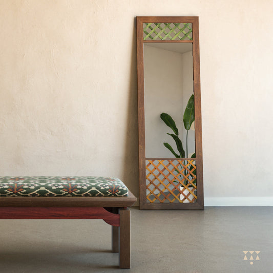 Wooden full-length mirror with a stand and trellis patterns tinted in Mocha Brown with Mustard Yellow & Moringa Green accents