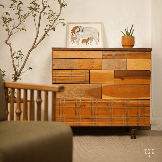 Big, wooden chest of drawers with the facade textured with Madras checks patterns, tinted in Mocha Brown & Mustard Yellow