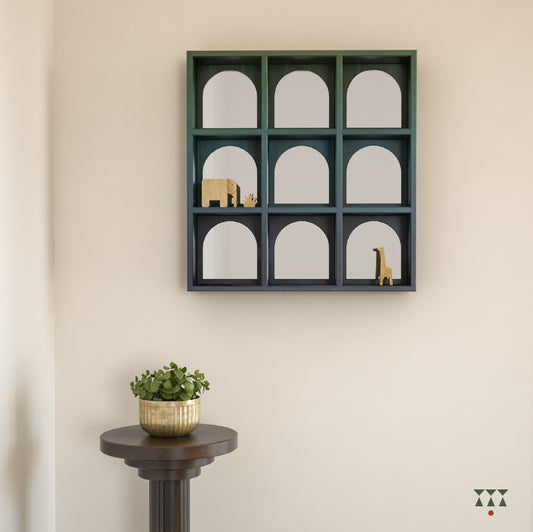 Solid wood mirror with 9 cubbies with arch patterns tinted in Moringa Green, Lagoon & Cobalt Blue