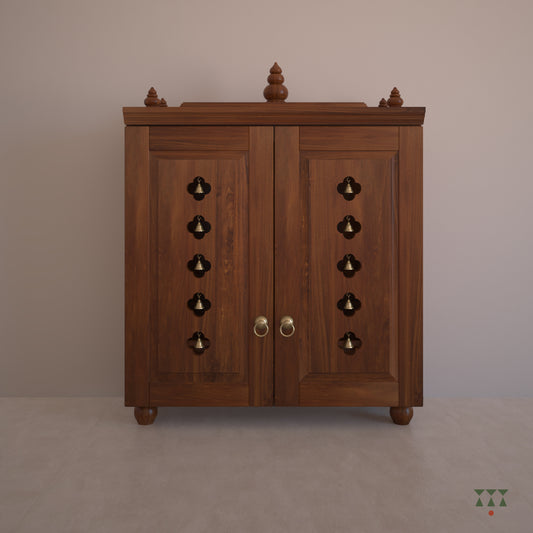 A solid wood mandir with doors, pure brass bells, accessories, cutwork designs and storage, tinted in almond brown