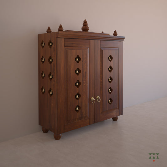 A solid wood mandir with doors, pure brass bells, accessories, cutwork designs and storage, tinted in almond brown