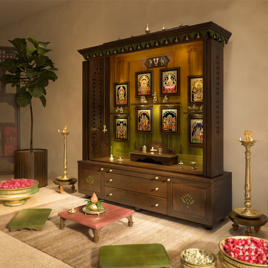 Wooden deity altar with framed images and decorative items in a room.