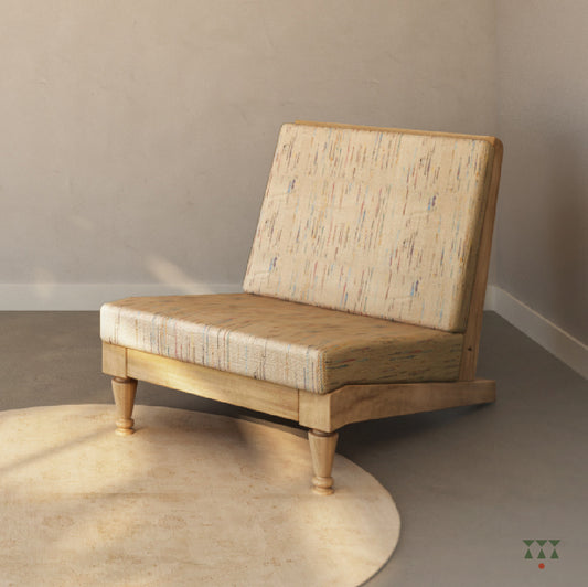 A solid wood lounge chair with a multicolored beige silk upholstery, tinted in sand brown