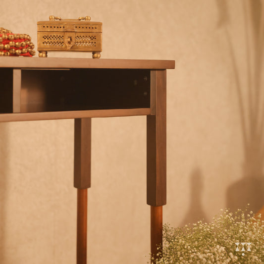 Close up of a solid wood console table with clean lines and storage tinted in Mocha Brown with a Mustard Yellow accent