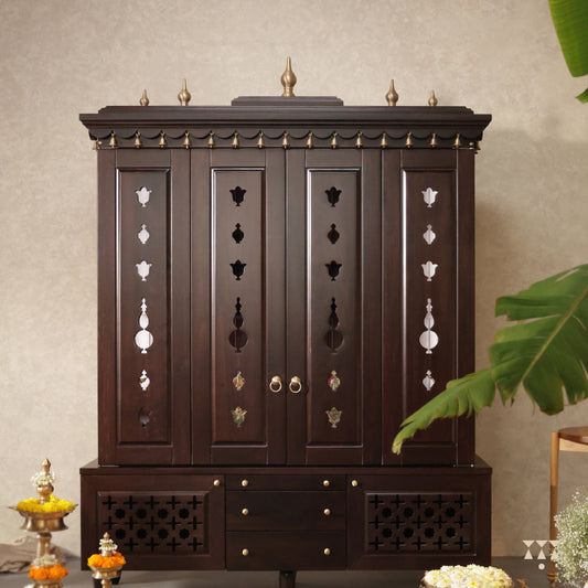 Pooja room set focusing on a solid wood mandir with doors, cutworks designs, pure brass element tinted in tamarind brown