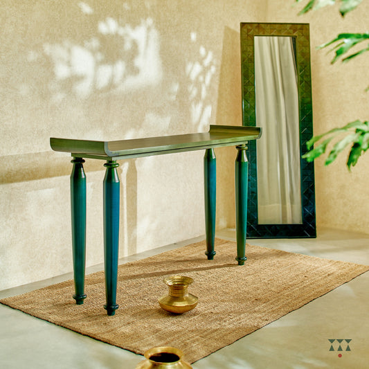 A console table and a solid wood full length mirror with a stand and a textured frame tinted in Moringa Green & Lagoon Blue
