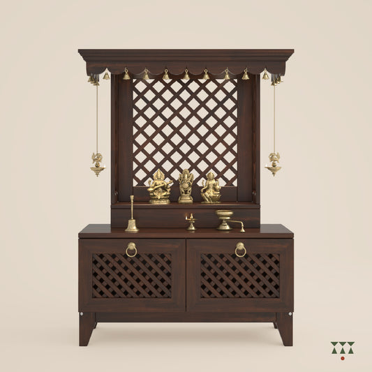 A wooden mandir with pure brass elements, trellis patterns and storage with doors, tinted in tamarind brown