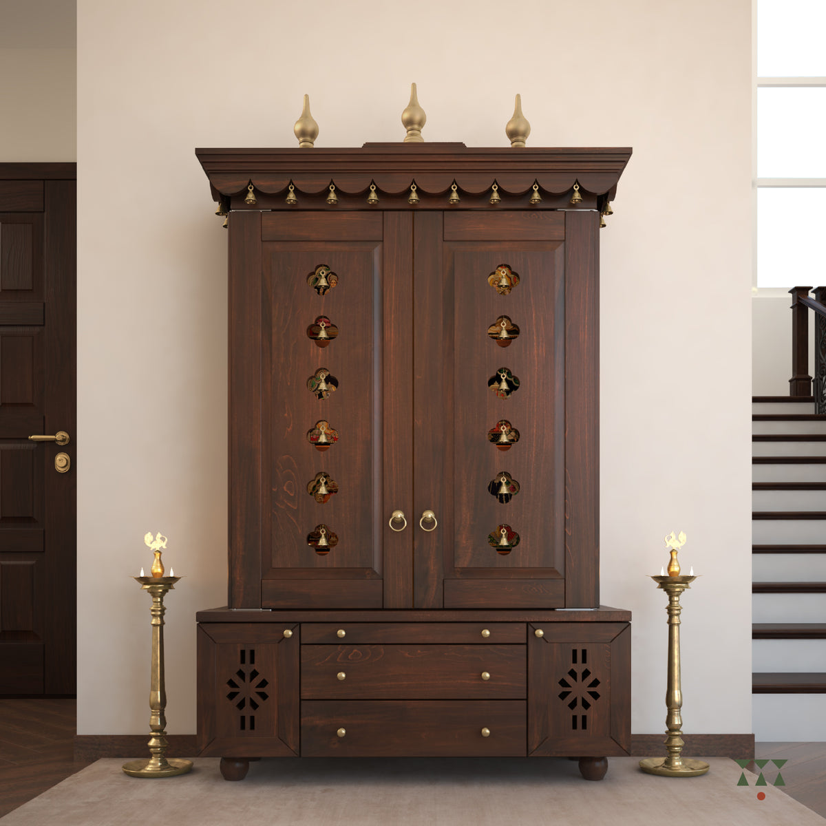 A solid wood mandir with doors, pure brass bells, accessories, cutwork designs and storage, tinted in a tamarind brown color