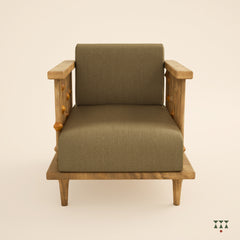 A solid wood statement chair with the arm and backrest made of multiple turned spindles, upholstered in rich colorful silk