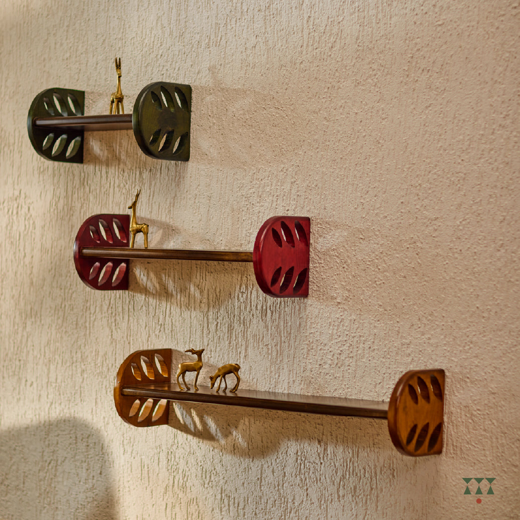 Set of 3, large solid wood shelves in assorted sizes. Each shelf is tinted in a different color with cutwork detailed ends