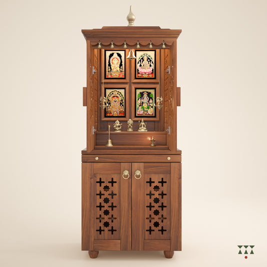 A tall wooden mandir with doors, pure brass elements, framed art prints, cutwork designs and storage, tinted in almond brown