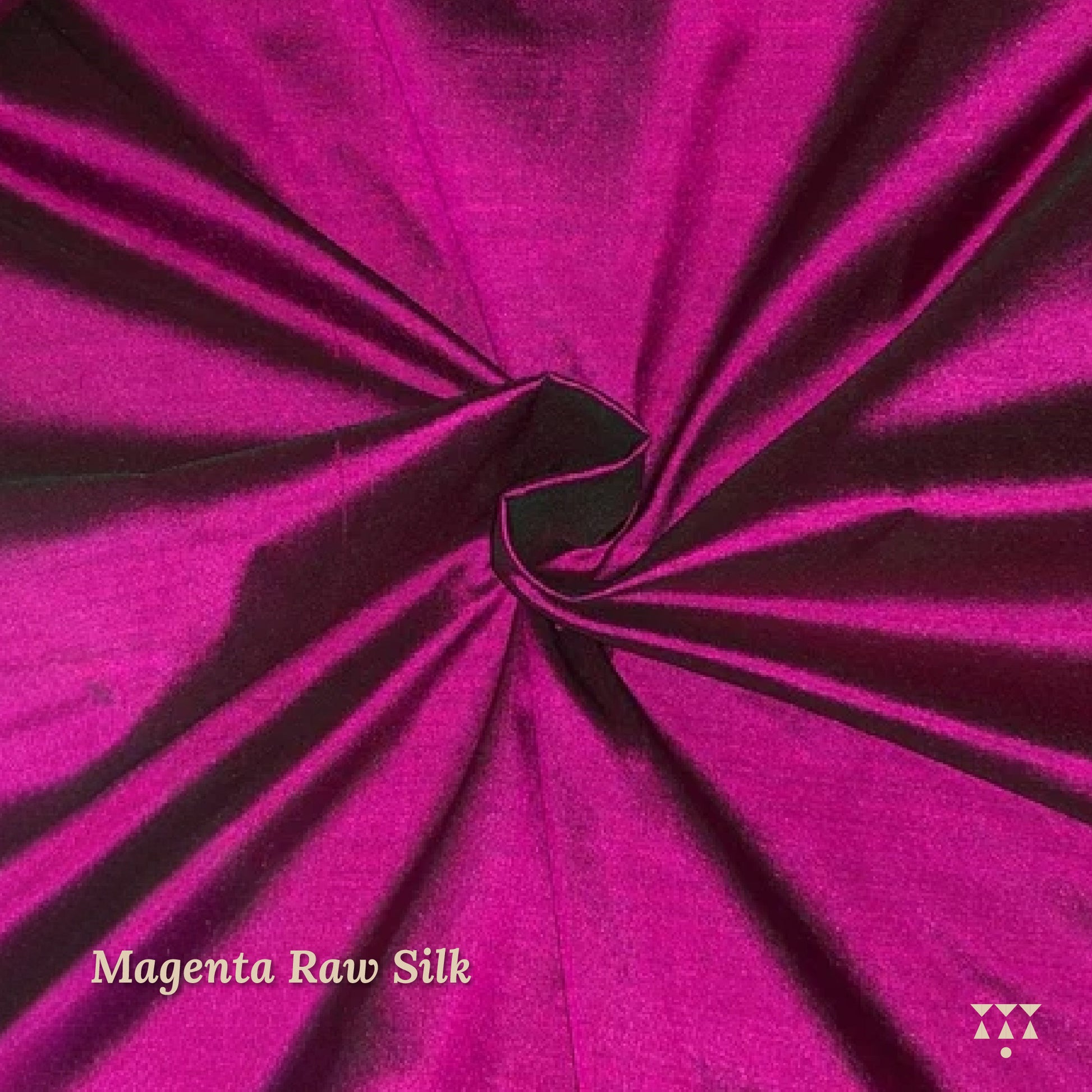 Close up of the magenta raw silk upholstery fabric for the wing chair 