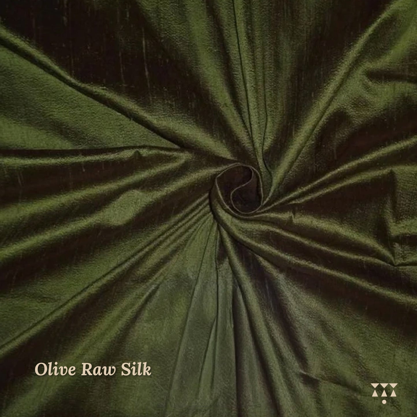 Close up of the olive-green raw silk upholstery fabric option for the wing chair 