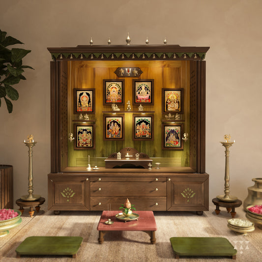 Wooden pooja unit with religious icons and decorations in a room.