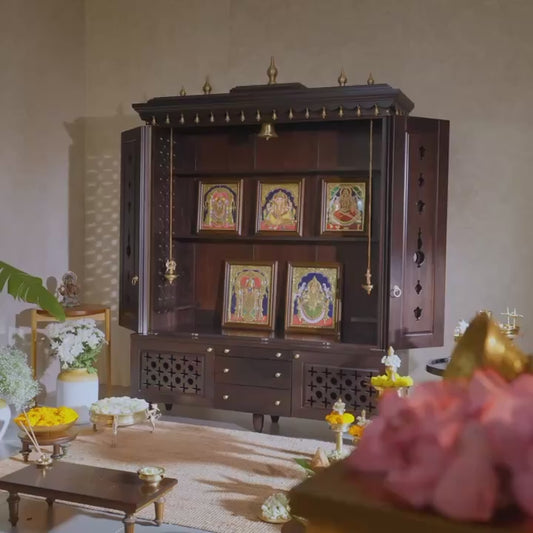 Video of solid wood mandir with pure brass bells, Tanjore art prints, cutwork designs and storage, tinted in Espresso brown