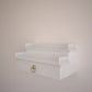 White wall mount prayer unit for Hindu puja